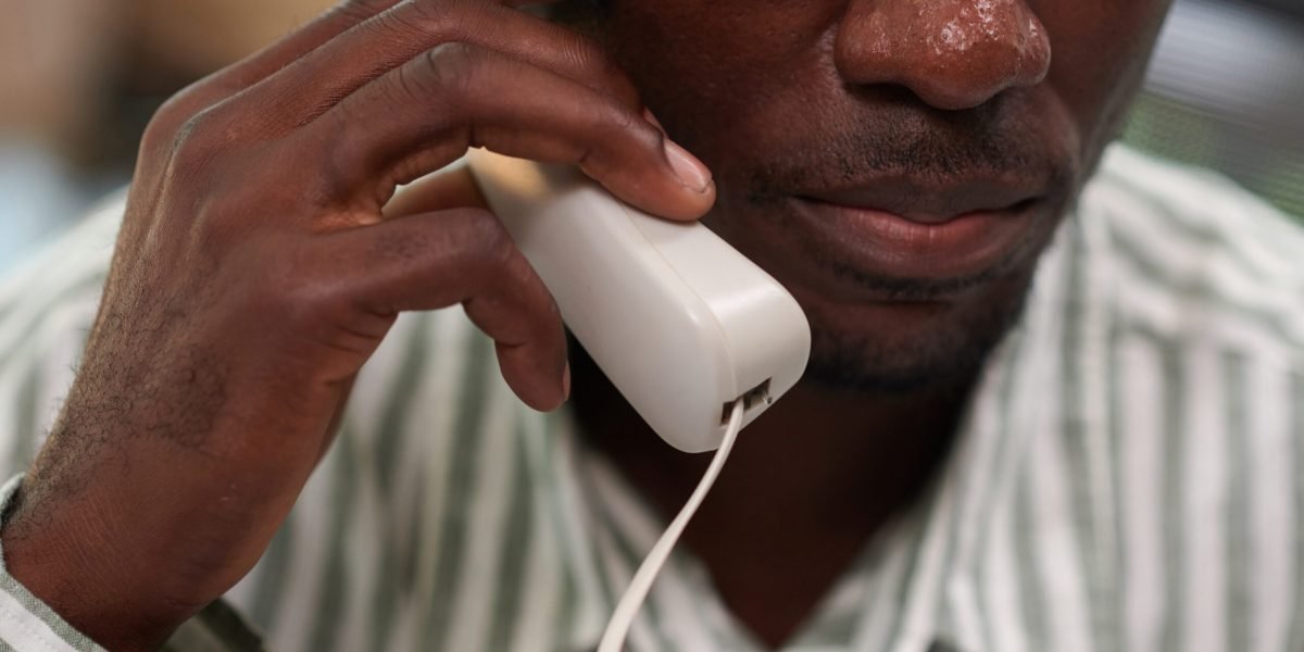 office-manager-answering-phone-call-2025-01-31-05-02-42-utc (1) (1)